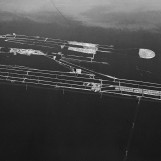 Detalj i lensa -  flyfoto av Glennetangen Lense 1985.